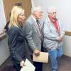 Harold J. Lyman, middle, of Blanding, enters the courtroom with his wife, right, and his lawyer. Some defendants charged in the artifact-looting probe made initial appearances in federal court in Moab on Thursday. Lyman, 78, pleaded not guilty to trafficking in stolen artifacts.