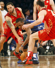 Photo by Chris Detrick | The Salt Lake Tribune 
Utah Jazz's Deron Williams and Manu Ginobili guard Rajon Rondo during the second half of the 2011 NBA All-Star game at the Staples Center Sunday February 20, 2011.    The West won 148-143.