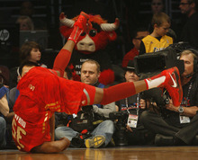 Photo by Chris Detrick | The Salt Lake Tribune 
Kevin Durant falls during the first half of the 2011 NBA All-Star game at the Staples Center Sunday February 20, 2011.    The West won 148-143.