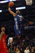 Photo by Chris Detrick | The Salt Lake Tribune 
Dwayne Wade dunks the ball during the first half of the 2011 NBA All-Star game at the Staples Center Sunday February 20, 2011.    The West won 148-143.