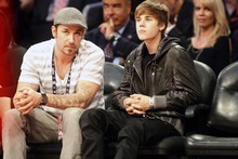 Photo by Chris Detrick | The Salt Lake Tribune 
Justin Bieber watches during the first half of the 2011 NBA All-Star game at the Staples Center Sunday February 20, 2011.    The West won 148-143.