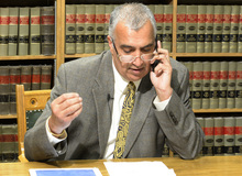   Rick Egan  | The Salt Lake Tribune 

Salt Lake District Attorney Sim Gill talks to a fellow attorney about the historic decision by U.S. District Court Judge Robert J. Shelby, that struck down the state's ban on same-sex marriage, Friday, December 20, 2013.  