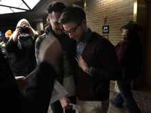   Leah Hogsten  |  The Salt Lake Tribune
Jeffery Gomez, left, and James Goodman  react after being told that they are officially married in the lobby of the Salt Lake County offices, Friday December 20, 2013. Several hundred people descended on the Salt Lake County Clerk's Office Friday afternoon to get licenses. U.S. District Court Judge Robert J. Shelby in Utah Friday struck down the state's ban on same-sex marriage, saying the law violates the U.S. Constitution's guarantees of equal protection and due process.  