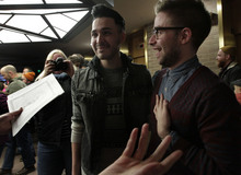   Leah Hogsten  |  The Salt Lake Tribune
l-r Jeffery Gomez and James Goodman  react after being told that they are officially married in the lobby of the Salt Lake County offices, Friday December 20, 2013. Several hundred people descended on the Salt Lake County Clerk's Office Friday afternoon to get licenses. U.S. District Court Judge Robert J. Shelby in Utah Friday struck down the state's ban on same-sex marriage, saying the law violates the U.S. Constitution's guarantees of equal protection and due process.  