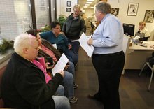   Utah County Clerk and Auditor Bryan Thompson hands out rejection letters for a marriage license to Raylynn Marvel left, Patsy Carter, 2nd left, from Orem, Utah, Loreen Major 2nd right, and Arlene Arnold right, from Lehi, Utah in the offices of the Utah County Clerk and Auditor office on Dec. 20, 2013 in Provo, Utah. A federal Judge on Friday struck down Utah's ban on same sex marriage saying the law violates the U.S. Constitution.  (Photo by George Frey  |  Special to the Tribune)  