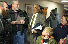   Keith Johnson | The Salt Lake Tribune

Salt Lake District Attorney Sim Gill talks to people gathered outside the Salt Lake County clerks office, Friday, December 20, 2013. A federal judge in Utah Friday struck down the state's ban on same-sex marriage, saying the law violates the U.S. Constitution's guarantees of equal protection and due process.  