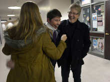   Scott Sommerdorf   |  The Salt Lake Tribune
Kody Partridge, center, reacts by letting out a yell after she was able to get a marriage license for her and her partner Laurie Wood, right to be married. Their friend Kellyn Maves, a former student at Rowland Hall, hugs Partridge at left. They were later married by the Rev. Curtis L. Price in the lobby of the Salt Lake County offices, Friday December 20, 2013.  