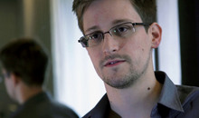   FILE - A Sunday, June 9, 2013, file photo provided by The Guardian newspaper in London shows Edward Snowden, who worked as a contract employee at the U.S. National Security Agency, in Hong Kong. A report that revealed the massive U.S. government surveillance effort is among the top finalists for the Pulitzer Prize. The stories were based on thousands of documents handed over by Snowden. The reports were published by Barton Gellman of The Washington Post and Glenn Greenwald, Laura Poitras and Ewan MacAskill of The Guardian. (AP Photo/The Guardian, File)  