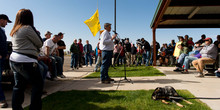   Trent Nelson  |  The Salt Lake Tribune
A group of people listen to San Juan County Commissioner Phil Lyman in Blanding's Centennial Park on Saturday, May 10, 2014, prior to an ATV protest ride into Recapture Canyon, closed to motorized use since 2007 to protect the 7-mile-long canyon's prehistoric sites.  