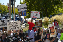   Leah Hogsten  |  The Salt Lake Tribune
Over a dozen families whose families have been killed or shot by police filled the crowd at the Families Speak Out On Police Violence rally Saturday, October 4, 2014, at the Matheson Courthouse.   