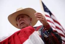   FILE - Rancher Cliven Bundy speaks at a protest camp near Bunkerville, Nev. Friday, April 18, 2014.  (AP Photo/Las Vegas Review-Journal, John Locher)  