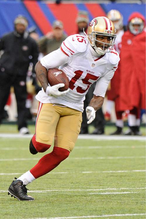 San Francisco 49ers wide receiver Michael Crabtree runs for a touchdown during the second half of an NFL football game against the New York Giants, Sunday, Nov. 16, 2014, in East Rutherford, N.J.  (AP Photo/Bill Kostroun)