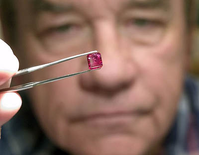 Rex Harris mines gem-quality red emeralds in his mine southwest of Milford, the only place in the world where they are found.