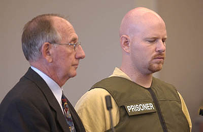 Mark Hacking, charged in the murder of his wife Lori Hacking appears before judge William W. Barrett in Salt Lake City court on Monday morning alongside his lawyer D. Gilbert Athay for a brief scheduling hearing.