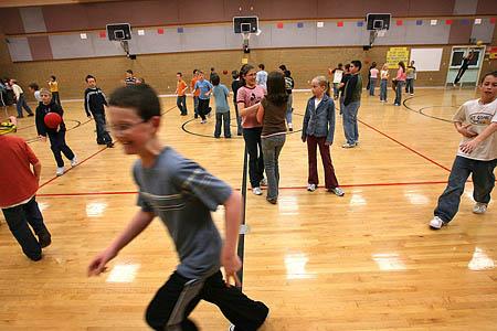 Students at Greenville Elementary School play in the school's gymnasium for recess. An air quality monitoring system in the North Logan school determined the air quality was not healthy for the kids to play outside Tuesday.