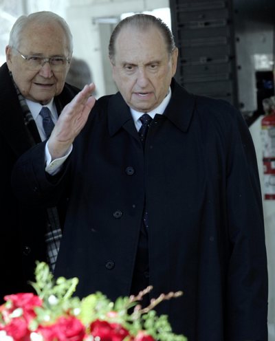 President Thomas S. Monson, right, gives a salute during the burial service of Gordon B. Hinckley, president of The Church of Latter-day Saints, on Saturday in Salt Lake City. Hinckley died Sunday. He was 97.