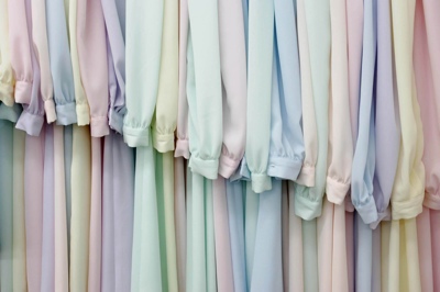 A rack of pastel colored dresses hang in the sewing facility on the YFZ ranch in Texas.
