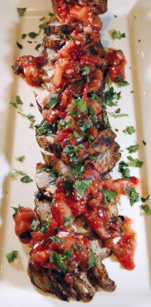 Salt Lake City -  Grilled pork tenderloin with grilled strawberry salsa was prepared by chef Cathie Mooere  at the Viking Cooking School in Salt Lake City Friday May 15, 2009.  Steve Griffin/The Salt Lake Tribune 5/15/09
