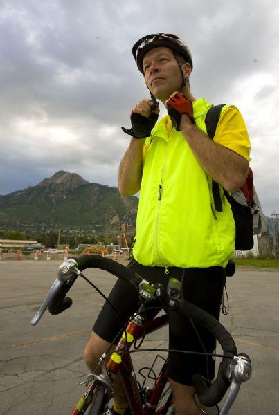 Chris Gamble, a family practice physician, rides his bike to and from work each day.  He rides from near the University of Utah to his clinic in Holladay, about 6 miles each way.

He is among members in faith communities participating in the Clear Air Challenge to reduce greenhouse gas.  Al Hartmann/The Salt Lake Tribune   7/1/09