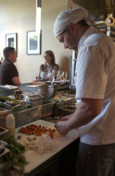 Mike Richey prepares a meal at Pago restaurant Friday, July 31, 2009.  The restaurant utilizes farmer-table approach, using local produce, eggs and Idaho beef. There about 20 entrees on each menu?breakfast, lunch and dinner.

Anna Kartashova / The Salt Lake Tribune