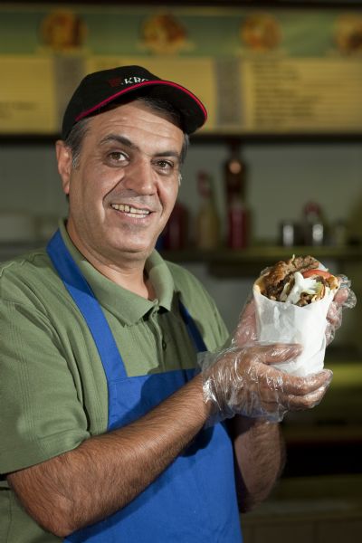 Owner Asghar Farajnejad holds the gyro sandwich ($5.49) at Best Chicken & Ribs Greek Food in Salt Lake City Tuesday September 1, 2009. 

Photo by Chris Detrick/The Salt Lake Tribune