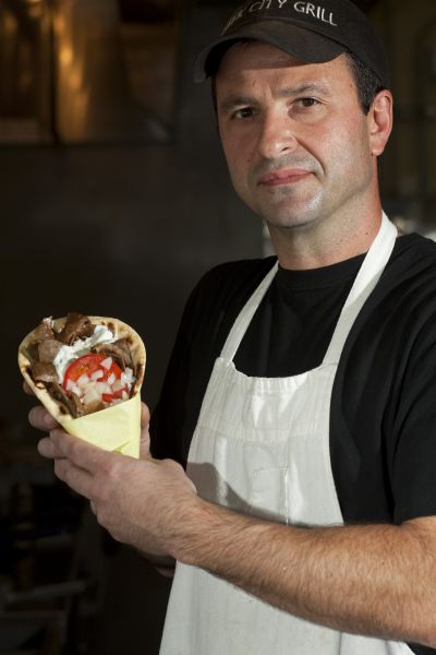 Owner Bob Daskalakis holds a traditional gyro ($4.75) at the Greek City Grill in Holladay Tuesday September 1, 2009. 

Photo by Chris Detrick/The Salt Lake Tribune