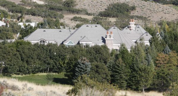 The former mansion home of Rick Koerber in Alpine, Utah. The home is behind security gates and obscured by trees.  Monday, September 28,2009  photo:Paul Fraughton/ The Salt Lake Tribune