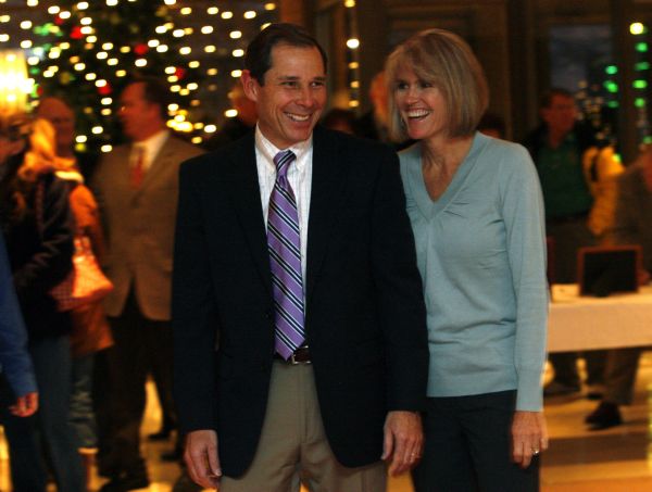 Above, John Curtis (above left with wife Sue Curtis, right) takes the ...