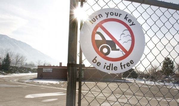 A sign at Morningside Elementary near the area where parents wait in their cars to pick up their children, is a reminder to drivers to turn off their engines while they wait.  Sixth grade students in Patti White's  class at the school have been working on a project to introduce a resolution in the Utah Legislature  to encourage the idle free  action.Wednesday, January 13,2010  photo:Paul Fraughton/ The Salt Lake Tribune