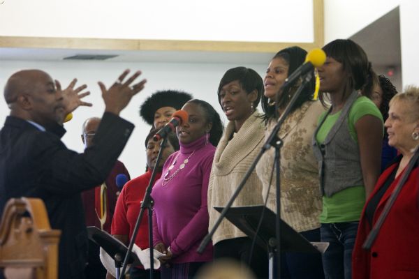 Photo by Chris Detrick  |  The Salt Lake Tribune 
Music Director Kevin Green leads the mass Choir during the Sunday morning worship service at the Second Baptist Church in Ogden Sunday January 10, 2010. 
]