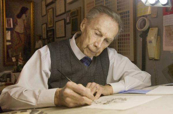 Pat Dennerworks at a drafting table  in his gallery on 300 South in Salt Lake City  on  Tuesday, January 5,2010  photo:Paul Fraughton/ The Salt Lake Tribune