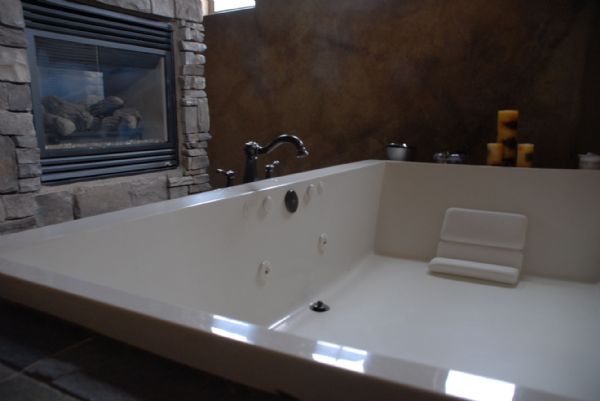 JAMI BONNER  | The Salt Lake Tribune

This is the bathtub in the master bedroom of Julius Erving's St. George home. The NBA legend has put the house on the market.
