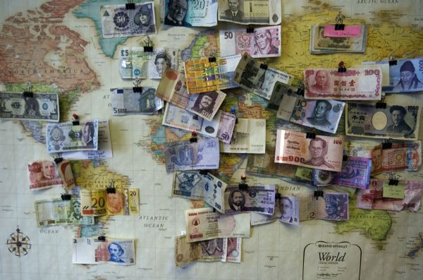 Jim Urquhart  |  The Salt Lake Tribune
A collection of currency hangs on the wall of finance professor Steve Thorley Tuesday, January 12 2010 at Brigham Young University's Marriott School of Management in Provo.BYU's business school is nationally ranked and approximately 1,800 undergraduate students and 1,000 graduate students are enrolled. 1/12/10