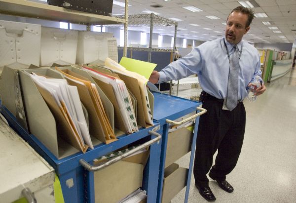 Jim Urquhart  |  The Salt Lake Tribune
Paul Mamo, field director of the IRS' Ogden Submission Processing Center, expalins how returns are processed Tuesday, January 19, 2010 at the Ogden Internal Revenue Service center campus in Ogden. The Ogden IRS facilities process business tax forms. The facilities employ about 6,500 staff and processed approximately 46 million returns in 180 different forms in 2009.