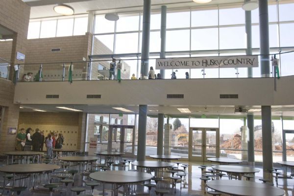 Students gather in small groups  to learn about the energy saving and ecological features of the new Hillside Middle School.Students from Beacon Heights Elementary toured the new Hillside Middle School  on  Wednesday, March 24,2010  photo:Paul Fraughton/ The Salt Lake Tribune