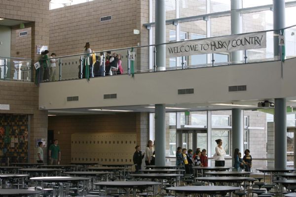 Students gather in small groups  to learn about the energy saving and ecological features of the new Hillside Middle School.Students from Beacon Heights Elementary toured the new Hillside Middle School  on  Wednesday, March 24,2010  photo:Paul Fraughton/ The Salt Lake Tribune