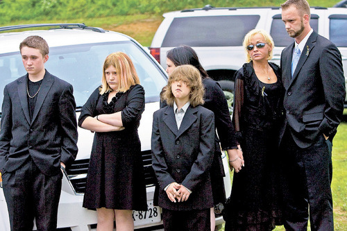 C
Destrian Stacy, 13, Alisa Stacy, 11, Ian Elswick, 10, Ireland Elswick, 12, Joe Stacy and his fiance, Becky Elswick, during the funeral service for Ethan Stacy at the Clinch Valley Memorial Cemetery in Richlands, Va. Chris Detrick | The Salt Lake Tribune