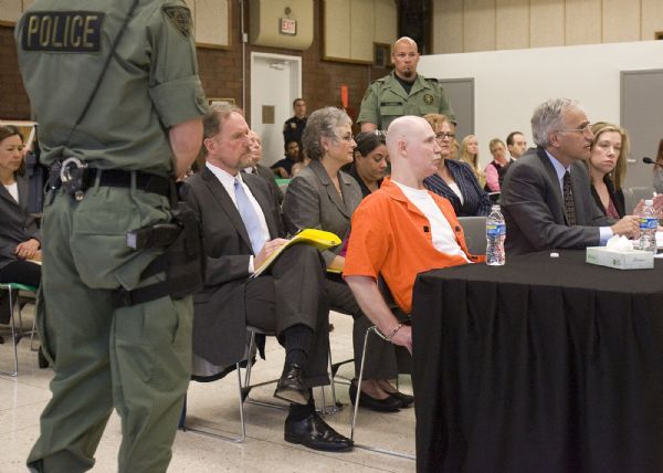 Trent Nelson | The Salt Lake Tribune

Ronnie Lee gardner listens to proceedings during his commutation hearing at the Utah State Prison in Draper, Utah, Thursday, June 10, 2010. next to him at the table are his attorneys Andrew Parnes and Megan Moriarty.