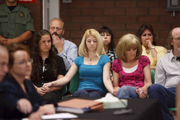 Family members of Nicolas G. Kirk, a deputy shot by Ronnie Lee Gardner, react as the Utah Board of Pardons and Parole announced its unanimous decision Monday to deny Ronnie Lee Gardner's request for commutation. He is scheduled to be executed by firing squad Friday. Left to right, front row, Jamie Stewart (granddaughter), Mandi Hull (granddaughter), Barb Webb (daughter). Left to right, back row, Doug Fawson (director of victim services, department of corrections), Tammie Atkin (victim advocate, Utah Attorney General's Office), Tami Stewart (daughter). Trent Nelson | The Salt Lake Tribune