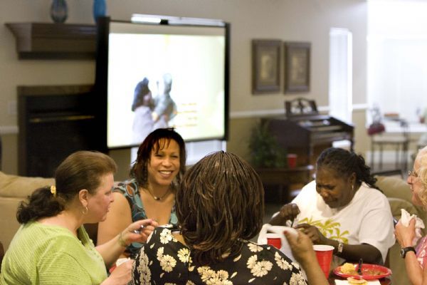 Invited guests enjoy a meal of catfish, coleslaw and baked beans, provided by the Trinity African Methodist Episcopal Church and  the Rev. Nurjhan Govan. After the meal, the group viewed the movie 