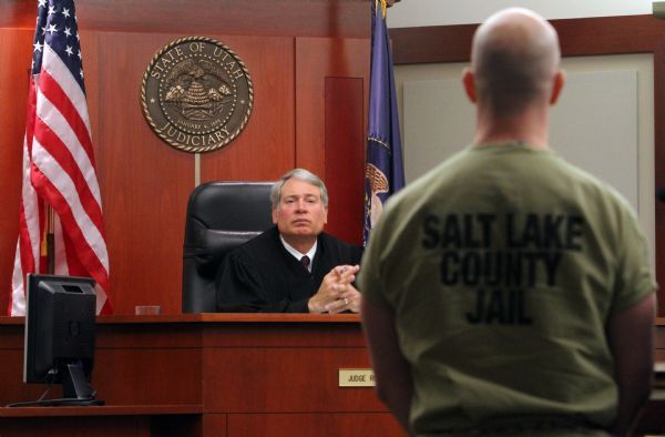 Rick Egan   |  The Salt Lake Tribune
Royal I. Hansen listens to Eugene Christopher Wright, as he appears at his sentencing hearing, at the Matheson Courthouse in Salt Lake City,  Friday, July 9, 2010. Wright was convicted by a jury for fatally shooting Utah County hockey coach and businessman Kenneth Dolezsar outside the Village Inn restaurant in Sandy in 2007.