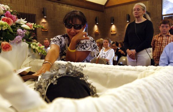 Leah Hogsten  |  The Salt Lake Tribune
Glenda Saade wept beside the coffin of   Sister Mary Joseph (Barbara) Whipperman. She considered the nun her best friend. Funeral services for   Sister Mary Joseph (Barbara) Whipperman at the Carmelite Monastery Chapel on Saturday July, 17, 2010. Sister Mary Joseph (Barbara) Whipperman, 77, died July 13, 2010 in Holladay, Utah. Born May 11, 1933, Salt Lake City, Utah, to Ernest and Edna Duncombe Whipperman. Raised in the LDS faith, she worked as a nurse's aide at LDS Hospital, and then enrolled in Brigham Young University's nursing program. She graduated with honors in 1956, beginning a career as a public health nurse in Salt Lake City. She entered the Carmelite Order in 1963.