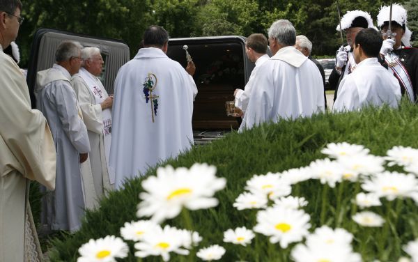 Leah Hogsten  |  The Salt Lake Tribune
Priest bless the casket of   Sister Mary Joseph (Barbara) Whipperman after funeral services. Funeral services for   Sister Mary Joseph (Barbara) Whipperman at the Carmelite Monastery Chapel on Saturday July, 17, 2010. Sister Mary Joseph (Barbara) Whipperman, 77, died July 13, 2010 in Holladay, Utah. Born May 11, 1933, Salt Lake City, Utah, to Ernest and Edna Duncombe Whipperman. Raised in the LDS faith, she worked as a nurse's aide at LDS Hospital, and then enrolled in Brigham Young University's nursing program. She graduated with honors in 1956, beginning a career as a public health nurse in Salt Lake City. She entered the Carmelite Order in 1963.