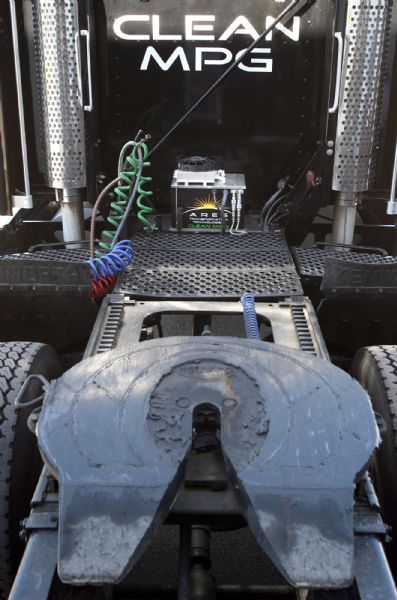 Steve Griffin  |  The Salt Lake Tribune

 The Clean MPG hydrogen flame acceleration device sits behind the cab of this 1996 Kenworth truck owned by Steve Pruitt of Salt Lake City. Pruitt has recently patented a system that will turn big diesel semitrucks into hybrids.   Thursday Jul 15, 2010.