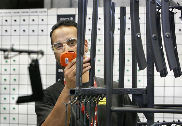 Scott Sommerdorf  l  The Salt Lake Tribune
Powder Coating Supervisor Richard Sheltra inspects table components that have just been powder coated in Lifetime's factory. Lifetime Products makes sports and camping equipment and is a major player in the state's exports. 
 in the Freeport Center in Clearfield