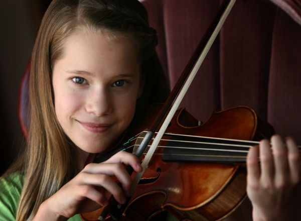 Leah Hogsten  |  The Salt Lake Tribune
Aubree Oliverson, 12, of Orem is the second place Utah winner in the Stradivarius International Violin Competition Junior Division, held July 12 at the University of Utah. She won $400. Aubree has been playing violin for six years.