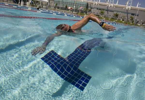 Jim Urquhart  |  The Salt Lake Tribune
Steve Avery of Riverton swims laps at the Oquirrh Park Fitness Center in Kearns. Voters recently defeated a $12 million bond for the fitness center that, among other things, would have covered the outdoor Olympic-sized swimming pool and added several amenities to the water park.