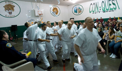 Al Hartmann|  The Salt Lake Tribune  3/26/2009&#xA;Participants in the Utah State Prison's Con-Quest substance abuse program attend a Spring graduation ceremony.   In the program, inmates are refered to as residents and live together in a dorm setting at the prison.   The program includes daily coursework and therapy on life skills.The Con-Quest 