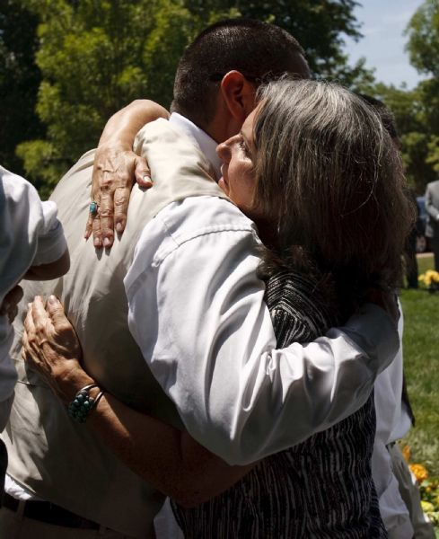 Photo by Trent Nelson  |  The Salt Lake Tribune

Dwayne Lee (left, son of George Lee) hugs his mother Kitty Hughes after graveside services for George P. Lee, in Washington, Tuesday, August 3, 2010.