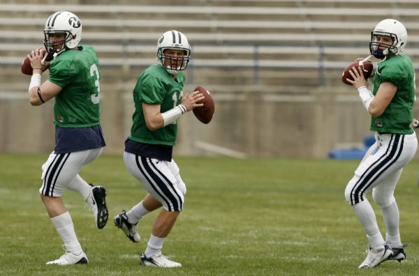 Photo by Leah Hogsten  |  The Salt Lake Tribune
l-r  Quartbacks James Lark, Riley Nelson and Jake Heaps throw to various running backs. 
BYU practice at Lavell Edwards Stadium in Provo on Saturday. 
  4/10/10 Provo
